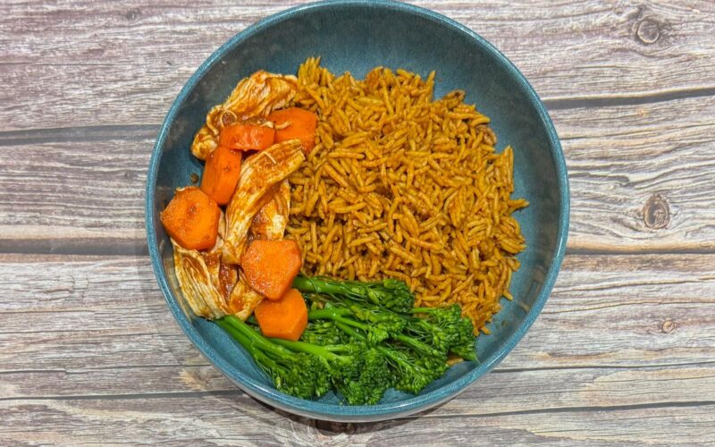 Stew Chicken with brocoli and Jollof rice Stew Chicken with brocoli and Jollof rice