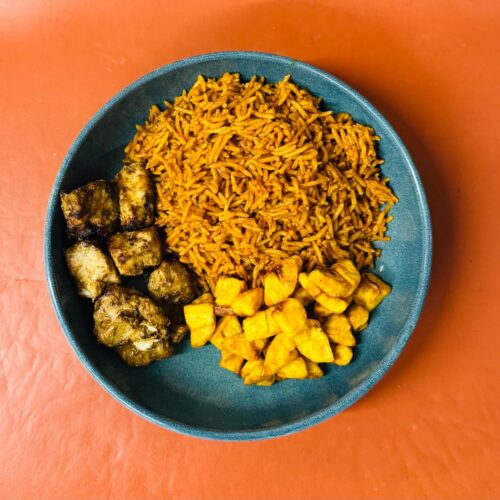 Jerk Chicken with Jollof rice and Plantain